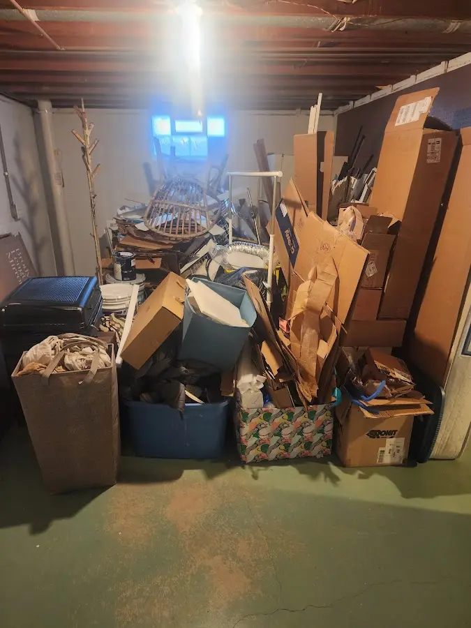 Roll-off dumpster container at job site for 6 Yard Dumpster Rental in Ridgeland